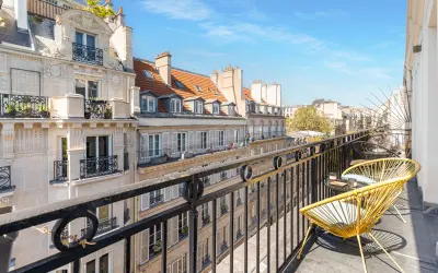 Appartement 4 900 €/mois PARIS (75009) photo 2