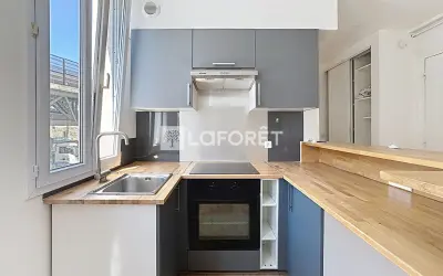 Appartement 1 080 €/mois SURESNES (92150) photo 2