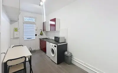Appartement 1 077 €/mois PARIS (75006) photo 2