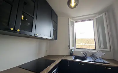 Appartement 1 360 €/mois PARIS (75015) photo 2